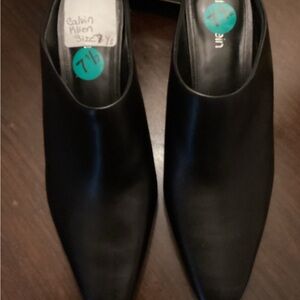 NWOT Calvin Klein Black Slip-On Shoes